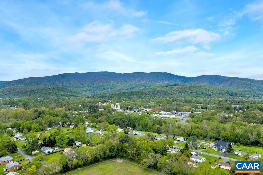 5543 Summerdean Road Crozet, VA 22932 - Photo 47 of 59 a view of a lush green field with mountains in the background