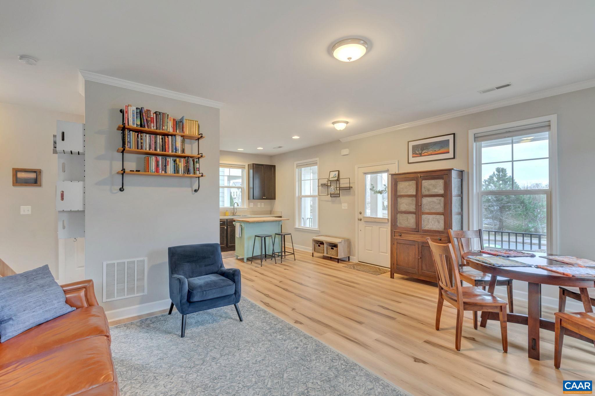 5543 Summerdean Road Crozet, VA 22932 - Photo 7 of 59 a living room with furniture wooden floor and a table