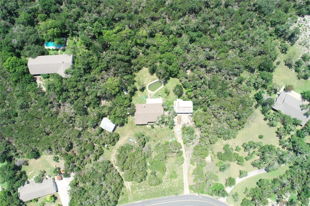 829 A Castle Ridge Road Austin, TX 78746 - Photo 6 of 6 Aerial overview of property's location featuring a heavily wooded area