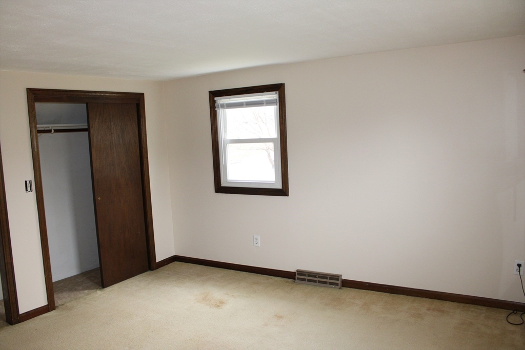 25 Lafond Drive Chicopee, MA 01020 - Photo 13 of 24 an empty room with a window
