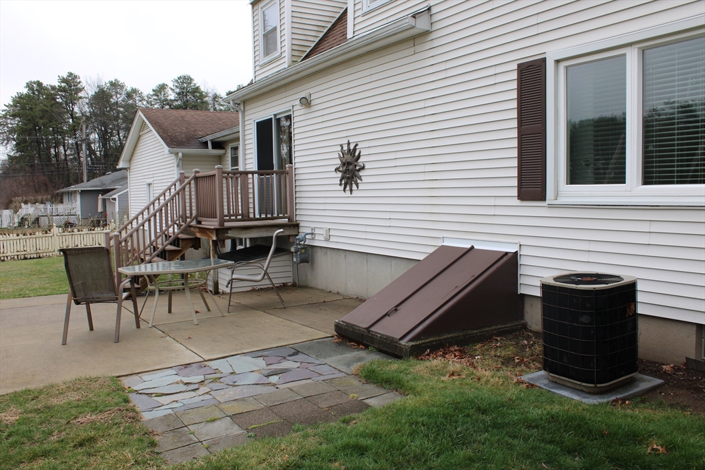 25 Lafond Drive Chicopee, MA 01020 - Photo 23 of 24 a view of a patio with a table and chairs