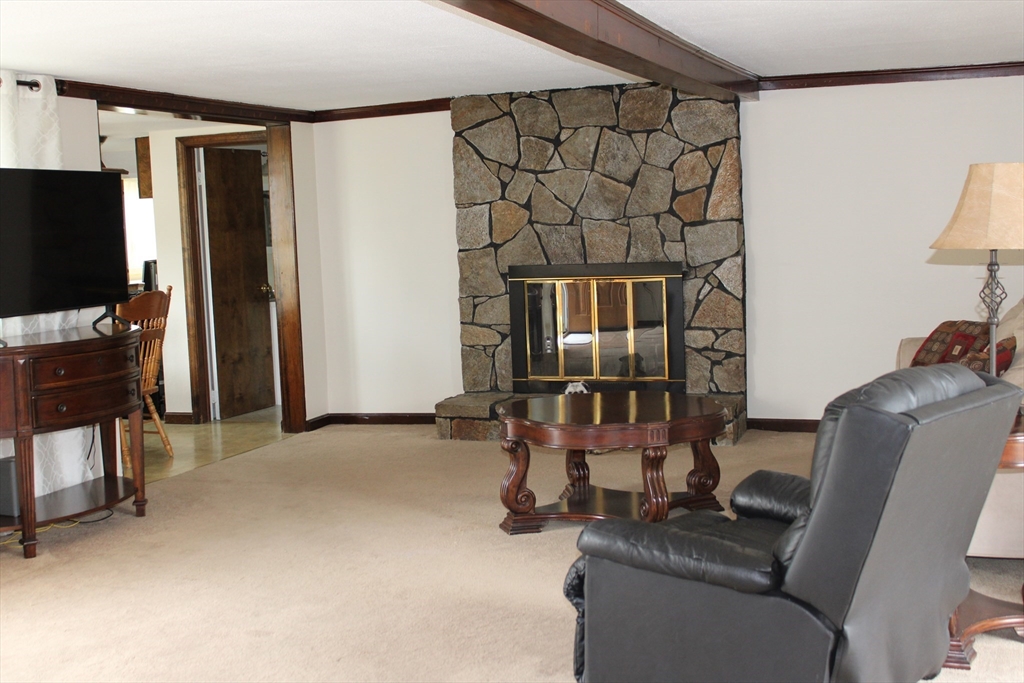 25 Lafond Drive Chicopee, MA 01020 - Photo 5 of 24 a living room with furniture and a flat screen tv