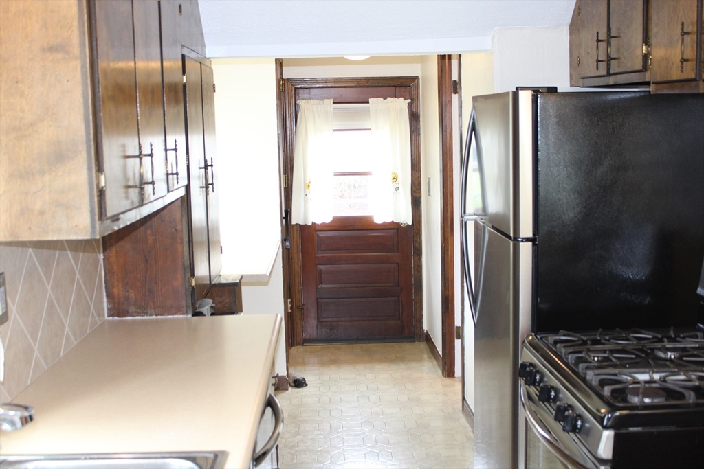 25 Lafond Drive Chicopee, MA 01020 - Photo 8 of 24 a kitchen with stainless steel appliances a refrigerator and a stove