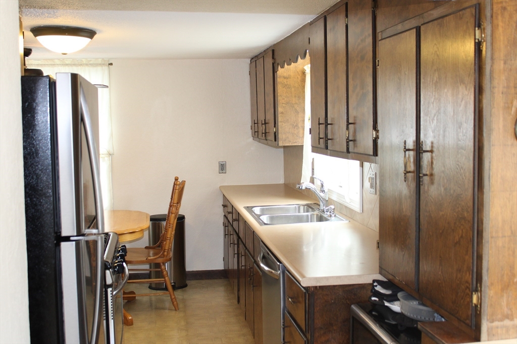 25 Lafond Drive Chicopee, MA 01020 - Photo 9 of 24 a bathroom with a sink vanity and a mirror