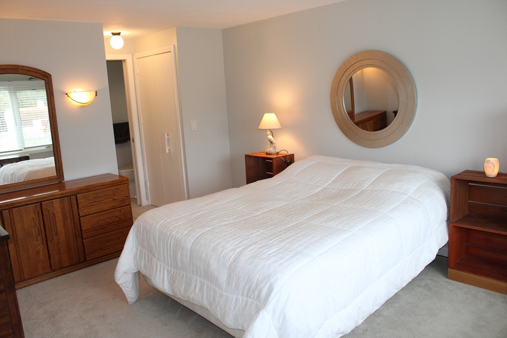 25 Lafond Drive Chicopee, MA 01020 - Photo 10 of 24 a bedroom with a bed and a dresser