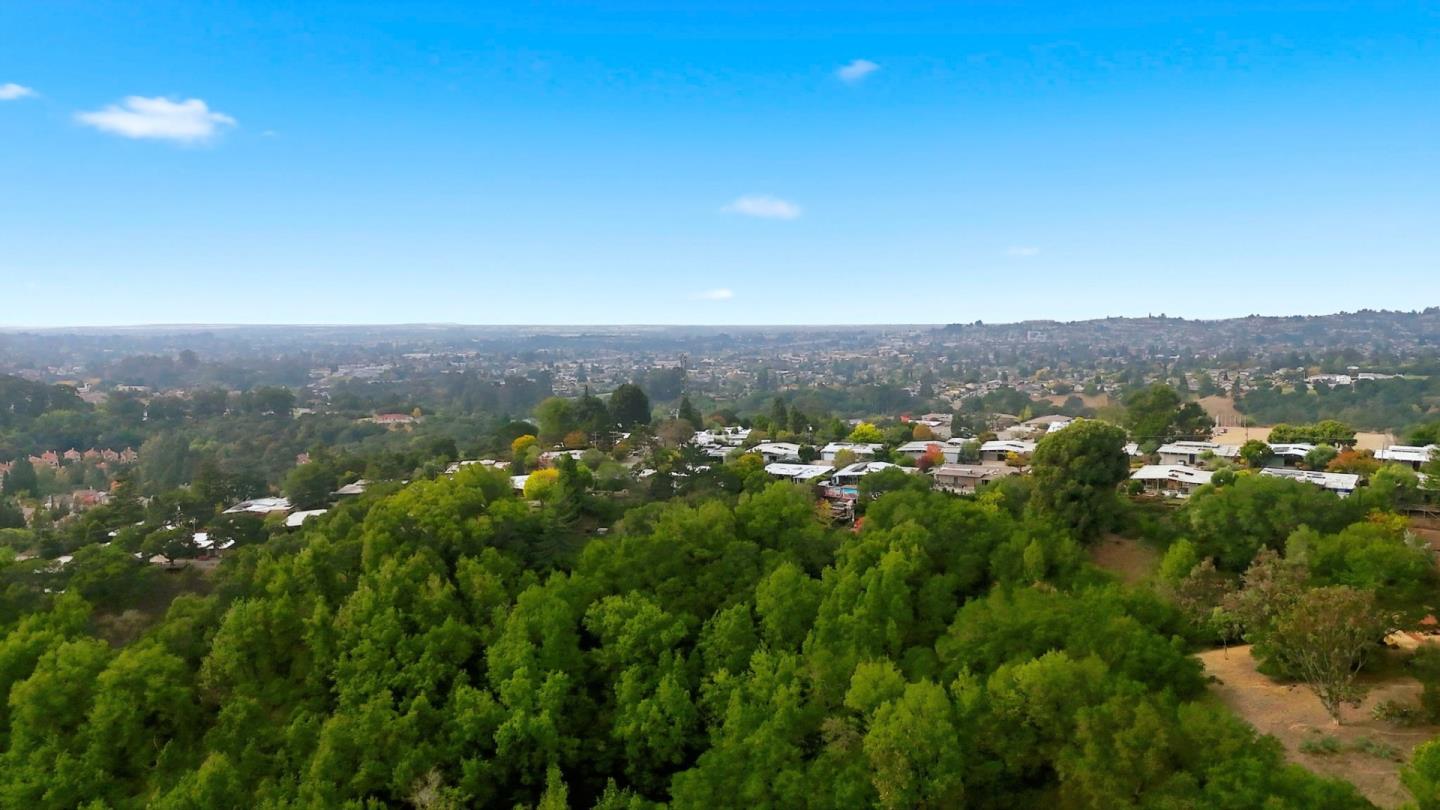 5603 Crow Canyon Road Castro Valley, CA 94552 - Photo 76 of 86 a view of a city with lush green forest