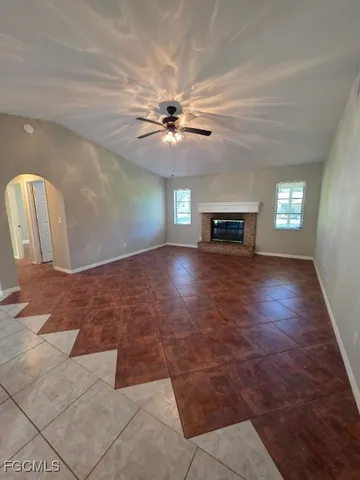 a view of livingroom with hardwood floor and ceiling fan