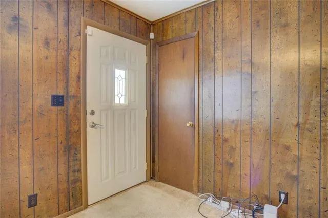 a bathroom with a shower and a sink