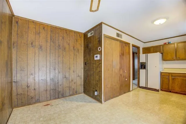 a view of a hallway with closet area