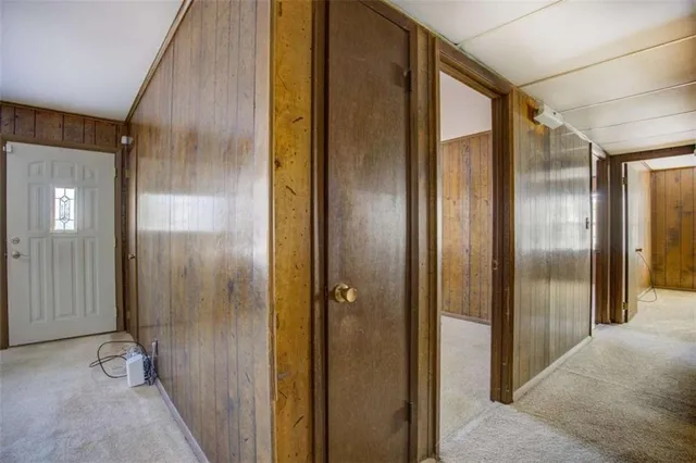 a bathroom with a glass shower door