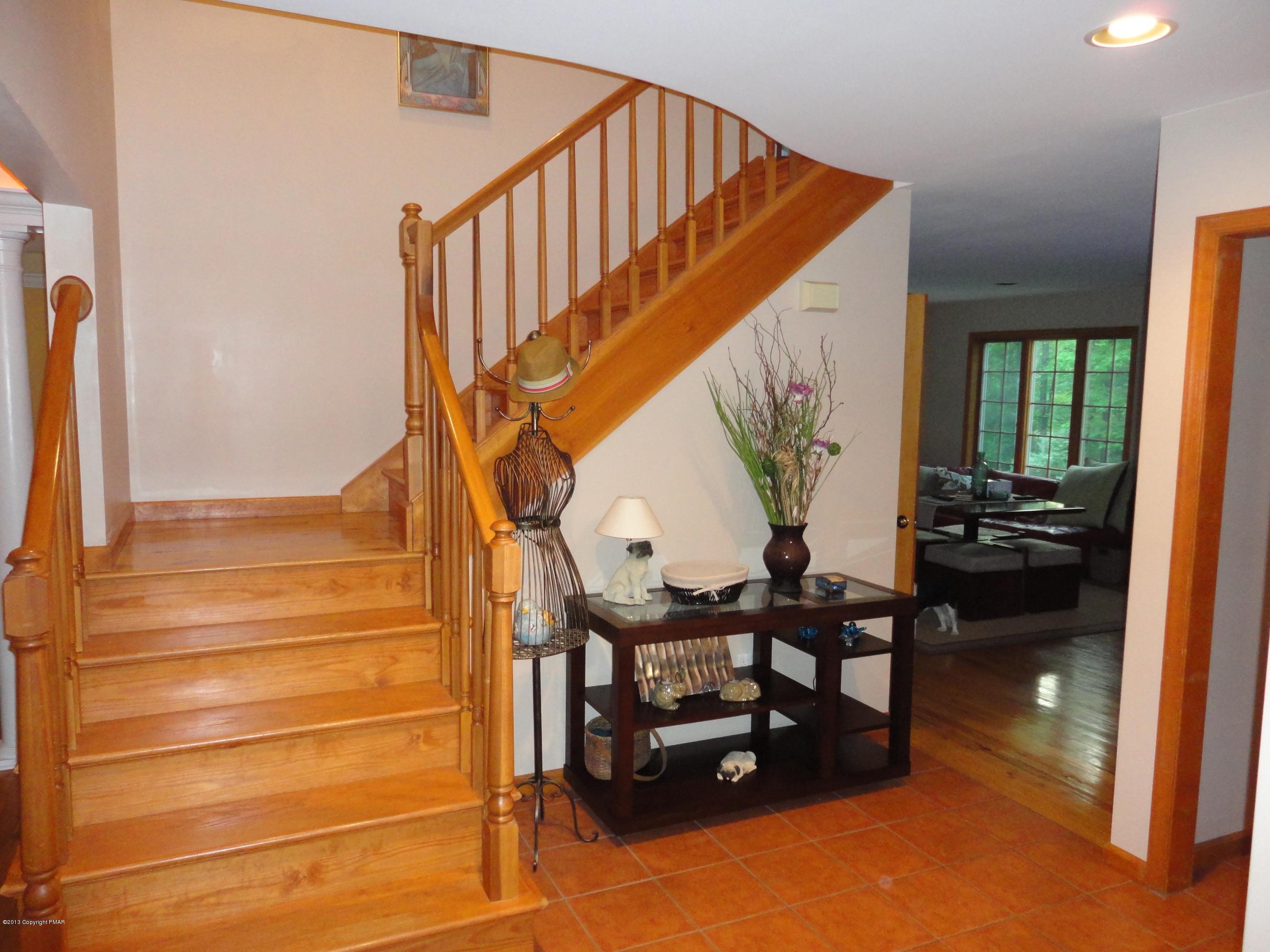 391 Turkey Ridge Road Mount Bethel, PA 18343 - Photo 2 of 19 a view of entryway and hall with wooden floor