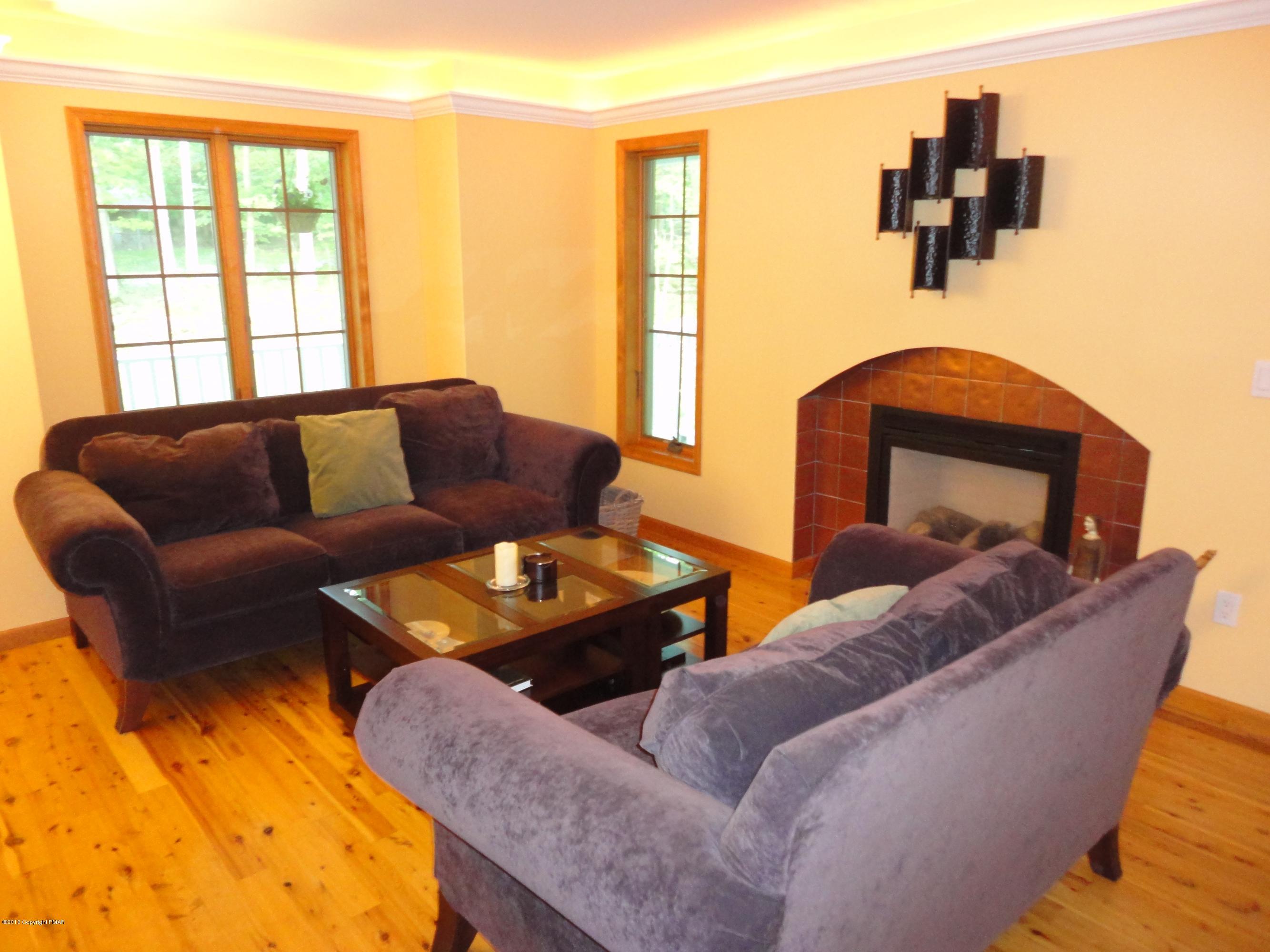 391 Turkey Ridge Road Mount Bethel, PA 18343 - Photo 6 of 19 a living room with furniture and a window