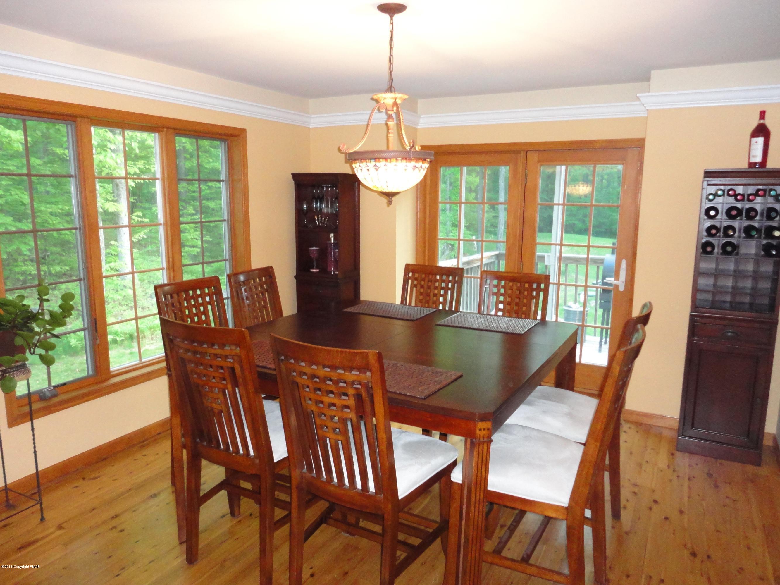 391 Turkey Ridge Road Mount Bethel, PA 18343 - Photo 7 of 19 a dining room with furniture window wooden floor