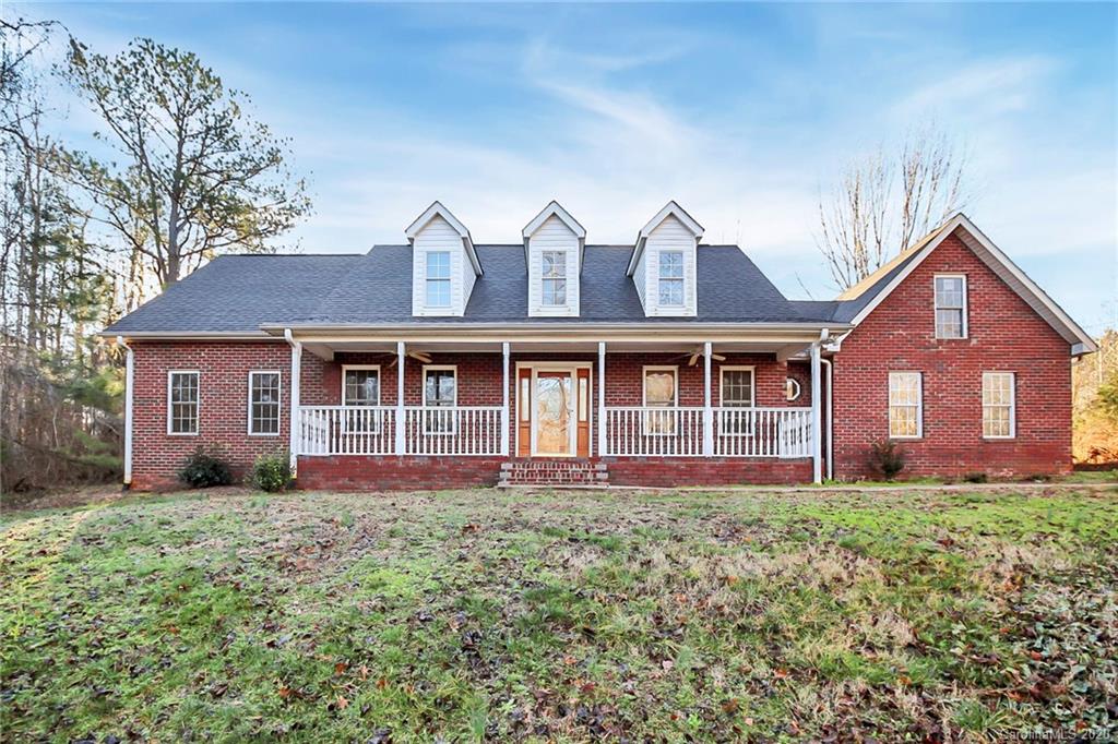 1465 Deer Run Road, Unit 3 Catawba, SC 29704 - Photo 22 of 31 a front view of a house with garden