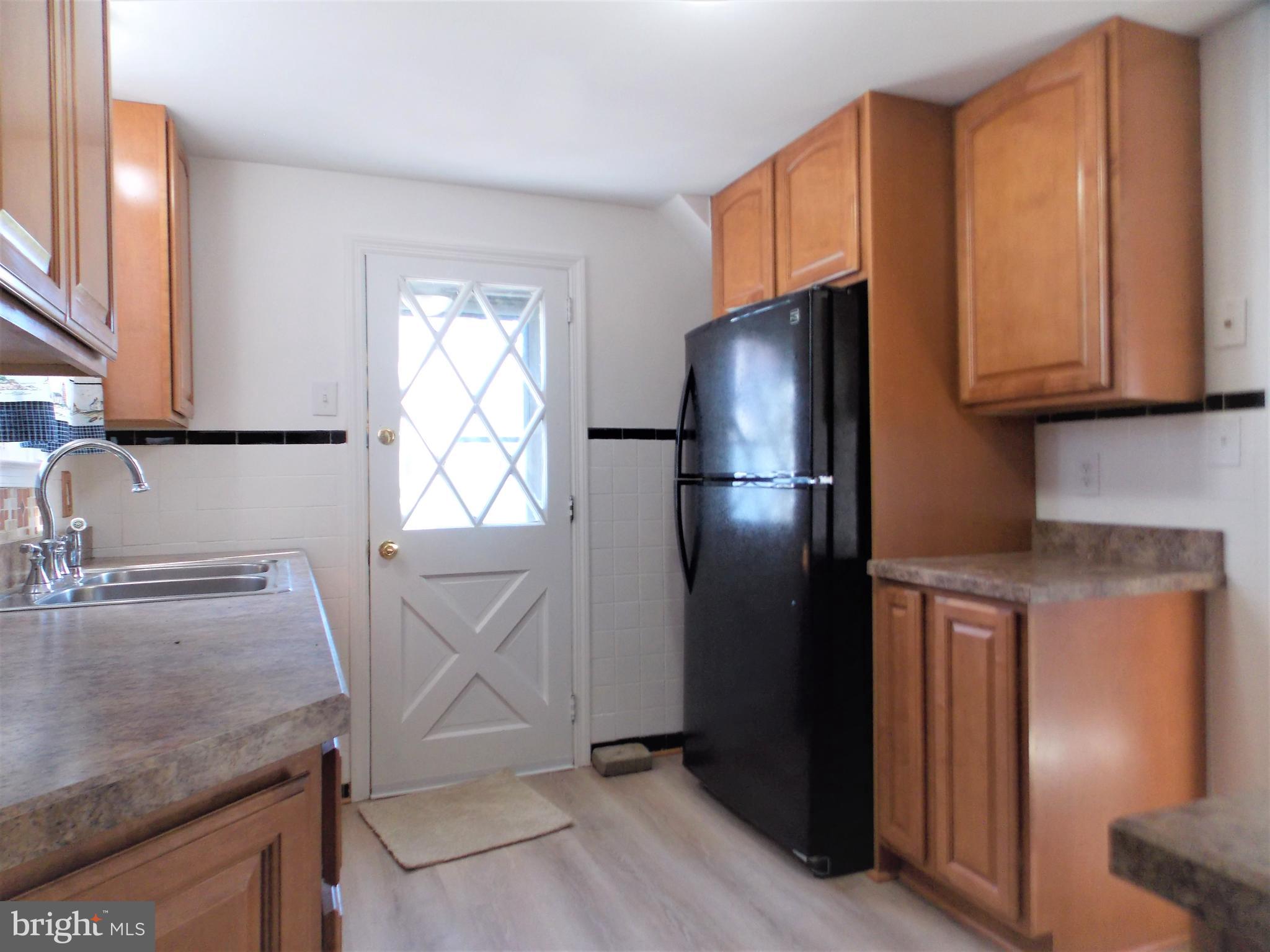 555 Holmes Road Morton, PA 19070 - Photo 11 of 26 Kitchen with outside entrance