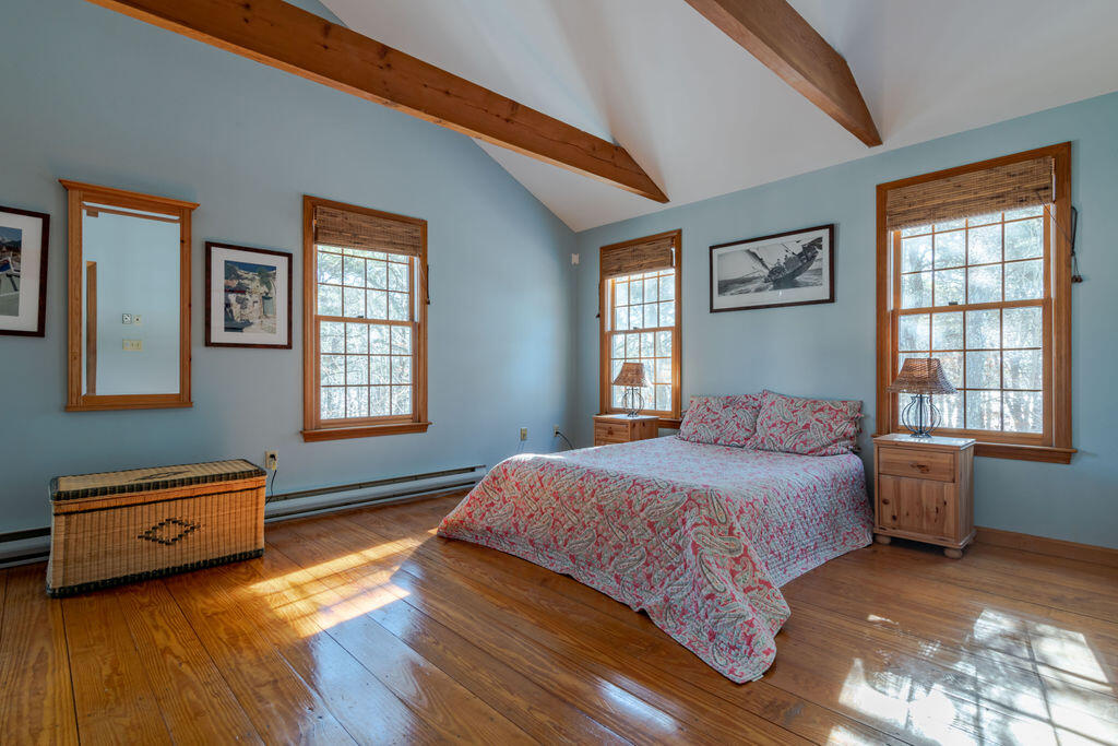 95 Cannon Hill Road Wellfleet, MA 02667 - Photo 13 of 36 a bedroom with a bed and a window