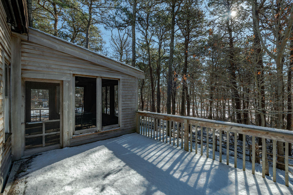 95 Cannon Hill Road Wellfleet, MA 02667 - Photo 27 of 36 a view of a two chairs in the balcony