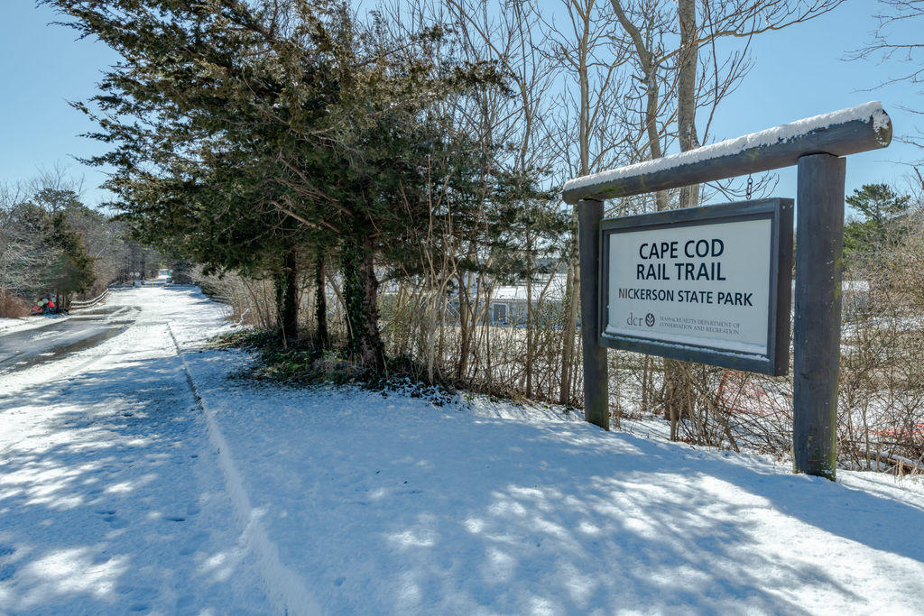 95 Cannon Hill Road Wellfleet, MA 02667 - Photo 33 of 36 a view of a street with sign board