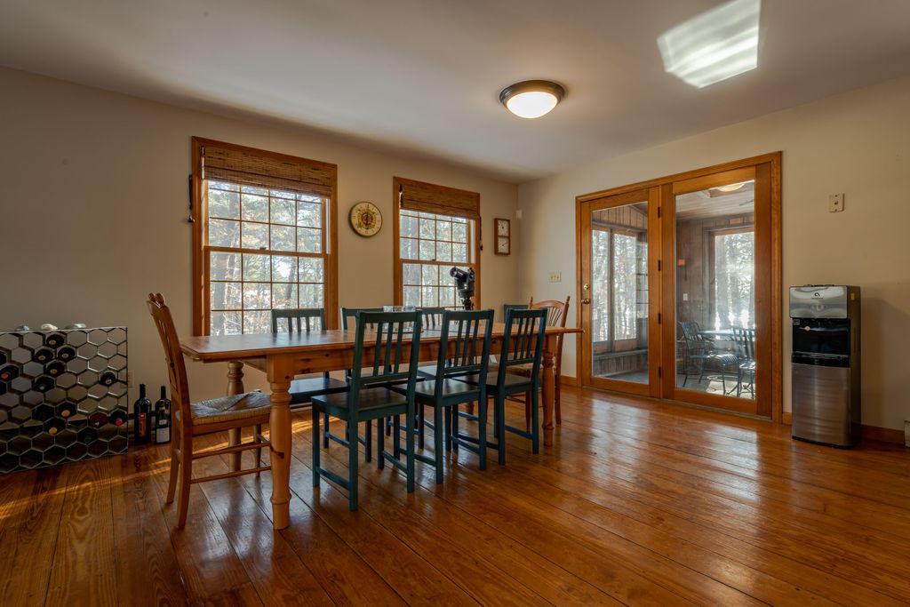 95 Cannon Hill Road Wellfleet, MA 02667 - Photo 9 of 36 a view of a a dining room with furniture window and wooden floor