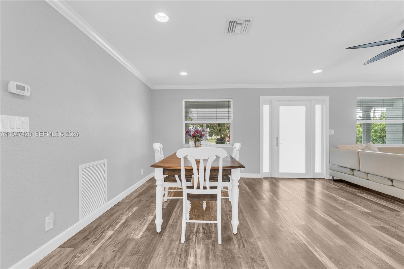 1405 Southwest 4th Terrace Pompano Beach, FL 33060 - Photo 11 of 44 a living room with furniture and a wooden floor