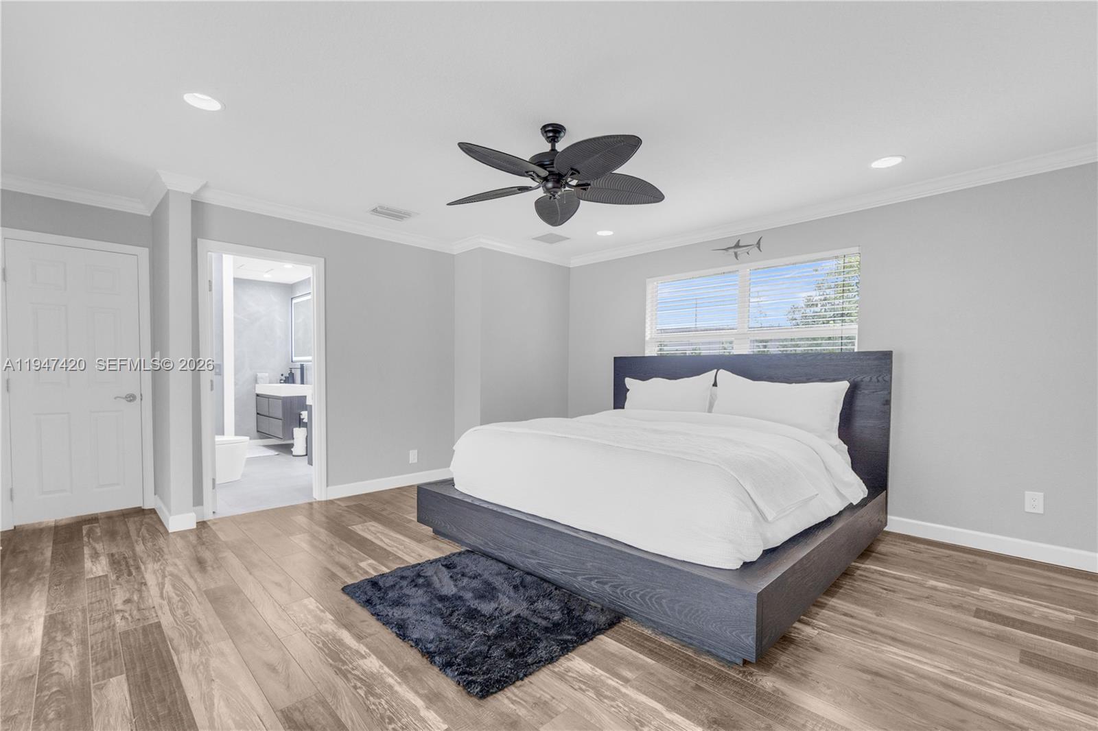 1405 Southwest 4th Terrace Pompano Beach, FL 33060 - Photo 26 of 44 a large white bed in a white room