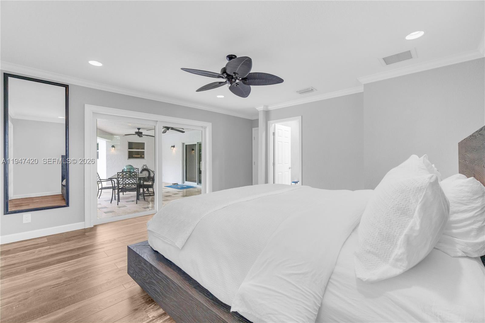 1405 Southwest 4th Terrace Pompano Beach, FL 33060 - Photo 27 of 44 a living room with furniture and a wooden floor