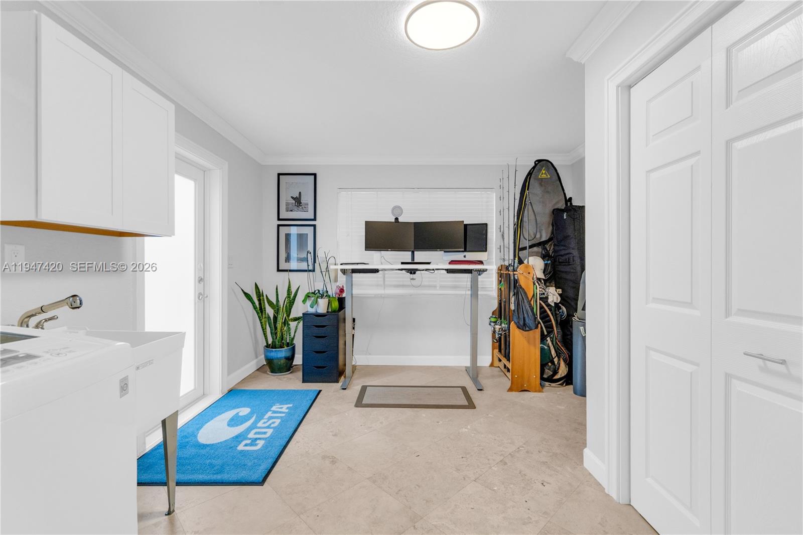 1405 Southwest 4th Terrace Pompano Beach, FL 33060 - Photo 33 of 44 a storage room with cabinets