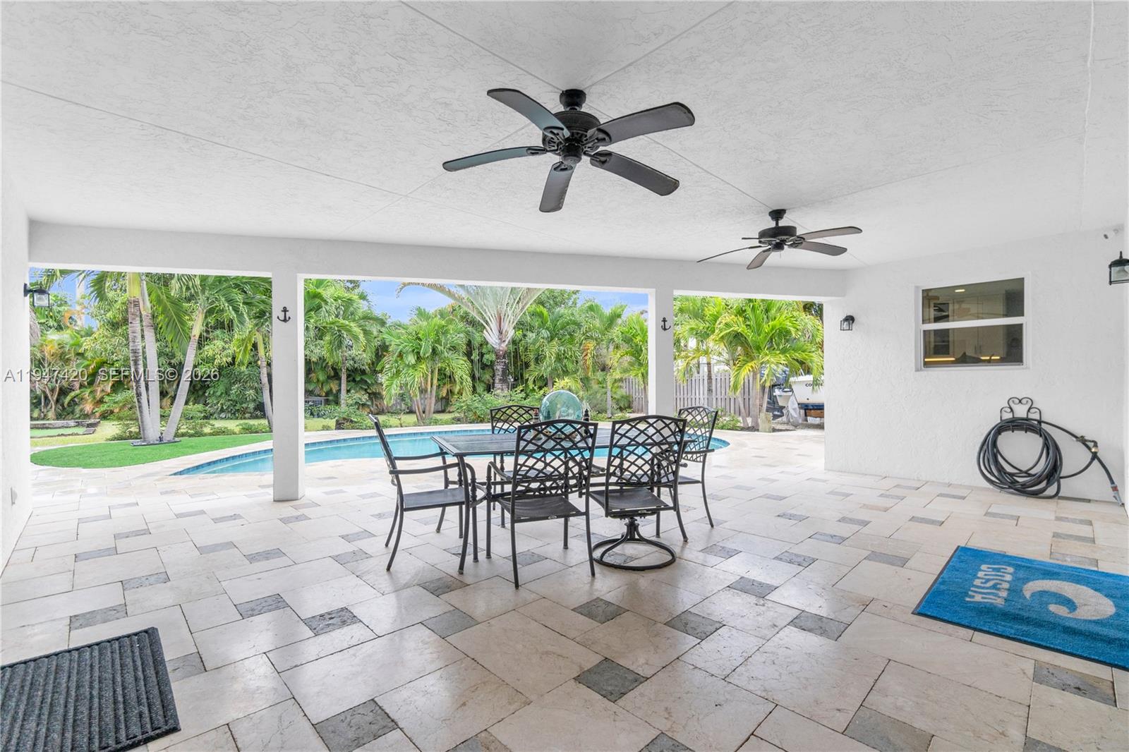 1405 Southwest 4th Terrace Pompano Beach, FL 33060 - Photo 35 of 44 a view of a dining room with furniture window and outside view