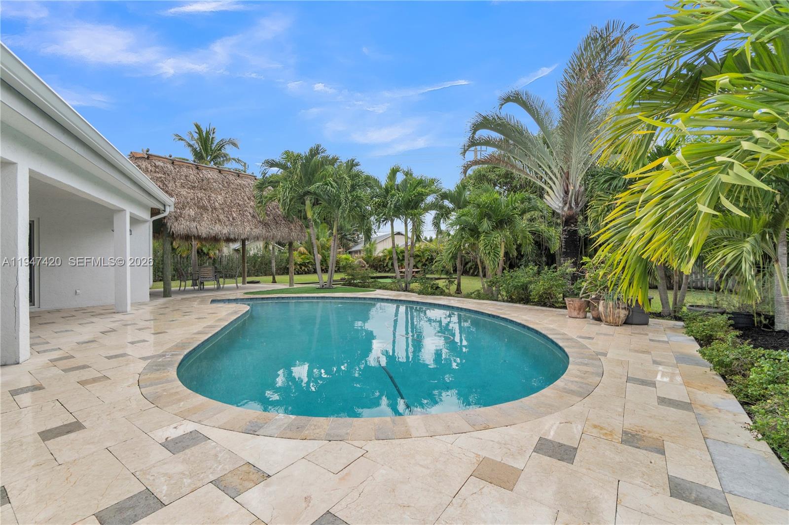 1405 Southwest 4th Terrace Pompano Beach, FL 33060 - Photo 37 of 44 a view of outdoor space yard swimming pool and patio