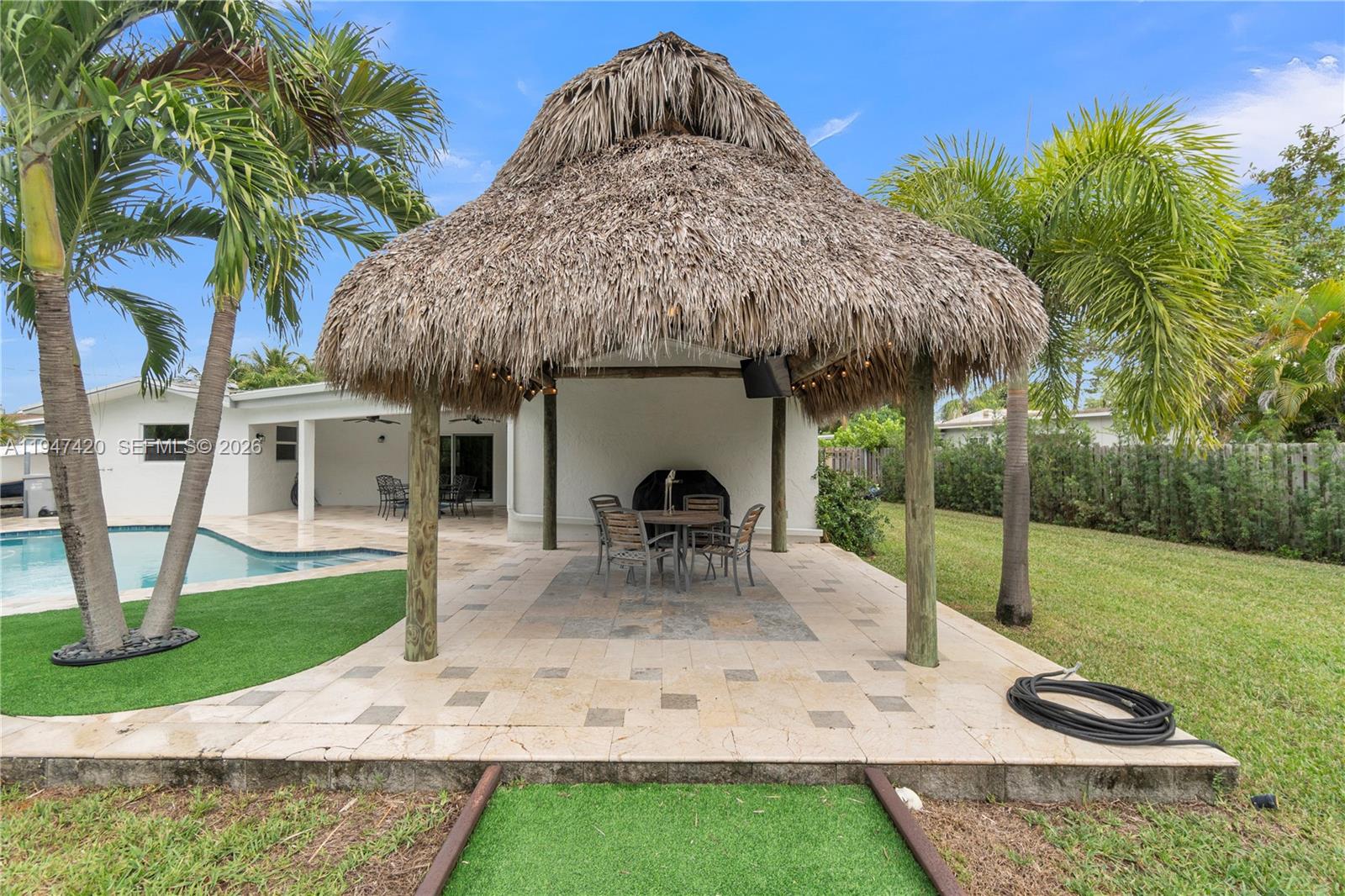 1405 Southwest 4th Terrace Pompano Beach, FL 33060 - Photo 39 of 44 a view of a house with backyard and sitting area