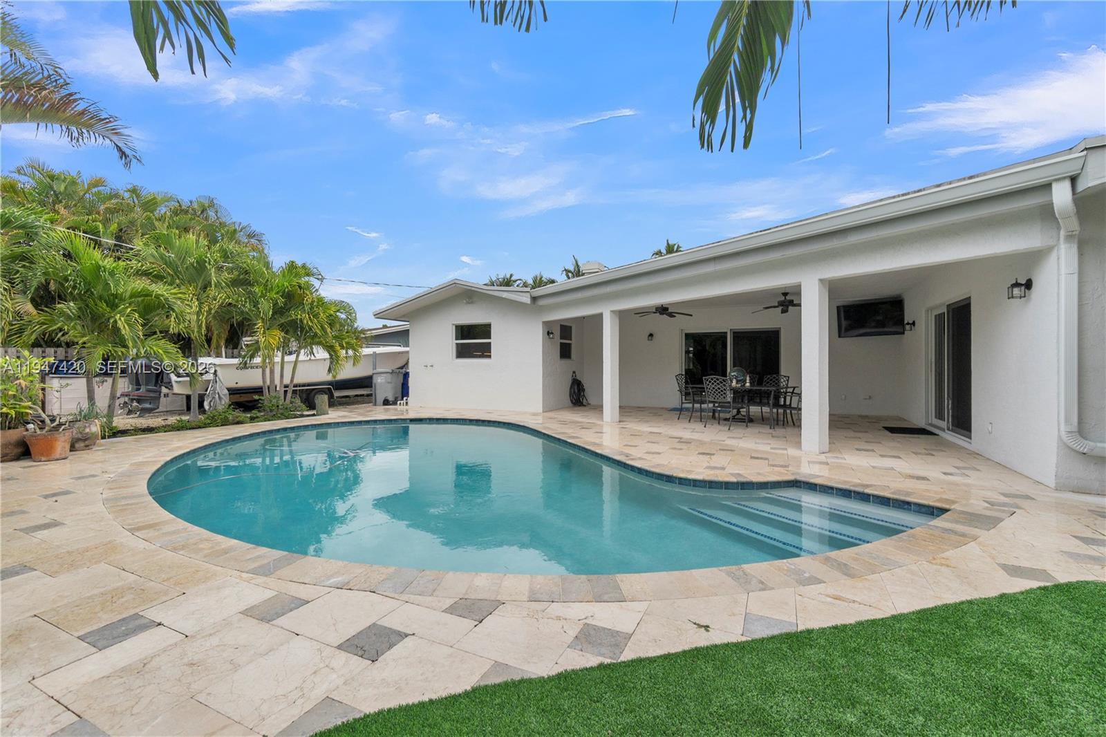 1405 Southwest 4th Terrace Pompano Beach, FL 33060 - Photo 41 of 44 a view of outdoor space yard swimming pool and patio