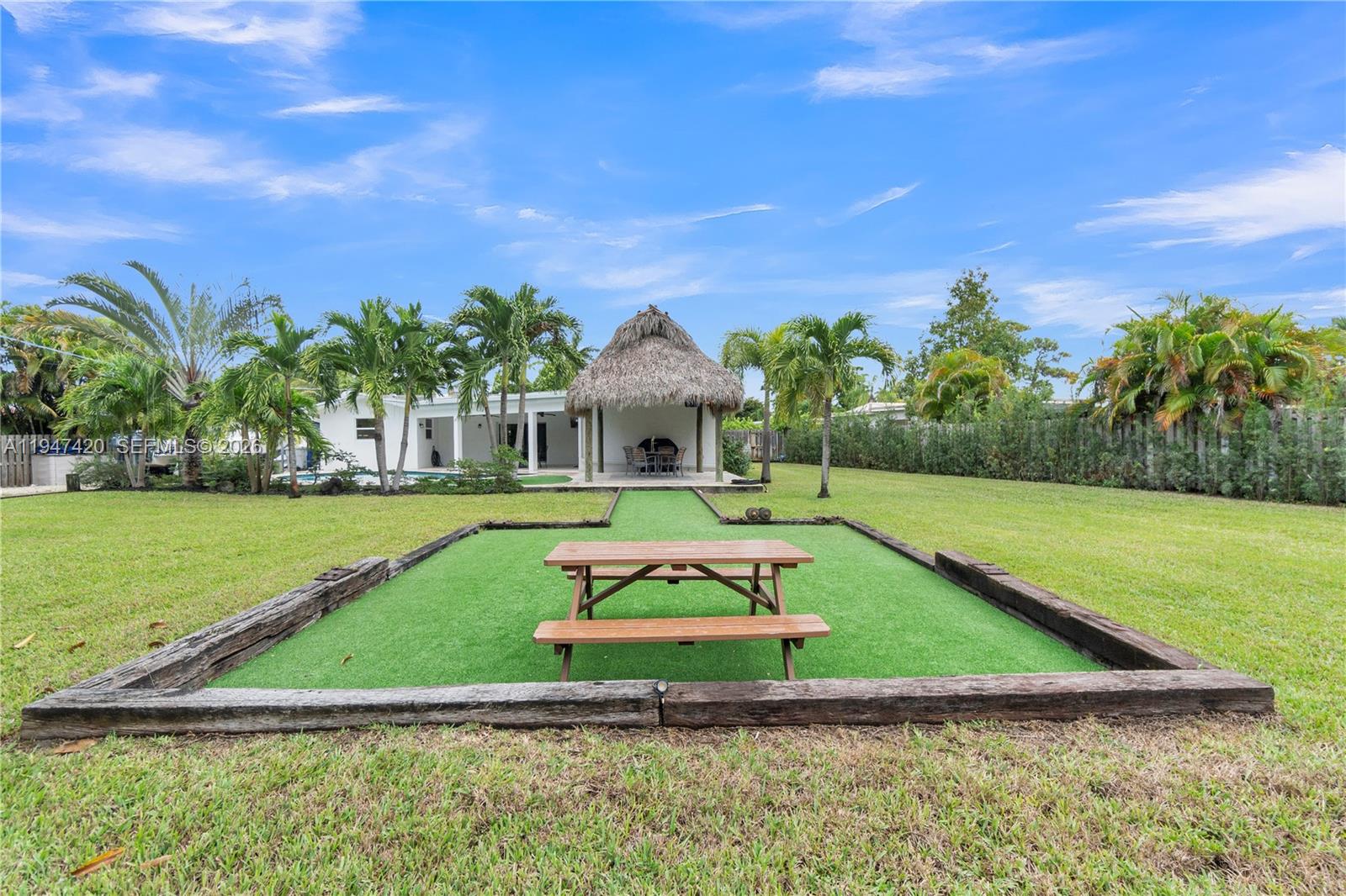 1405 Southwest 4th Terrace Pompano Beach, FL 33060 - Photo 42 of 44 a view of a house with a big yard