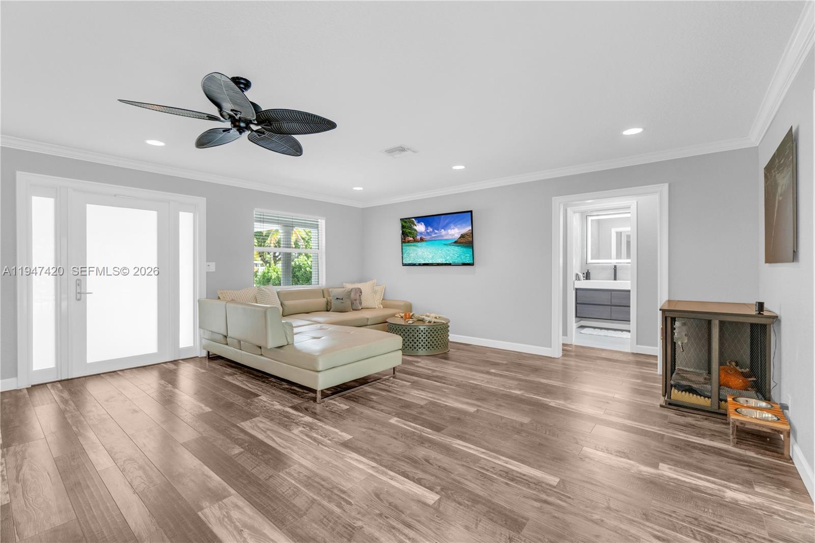 1405 Southwest 4th Terrace Pompano Beach, FL 33060 - Photo 6 of 44 a living room with furniture and a wooden floor
