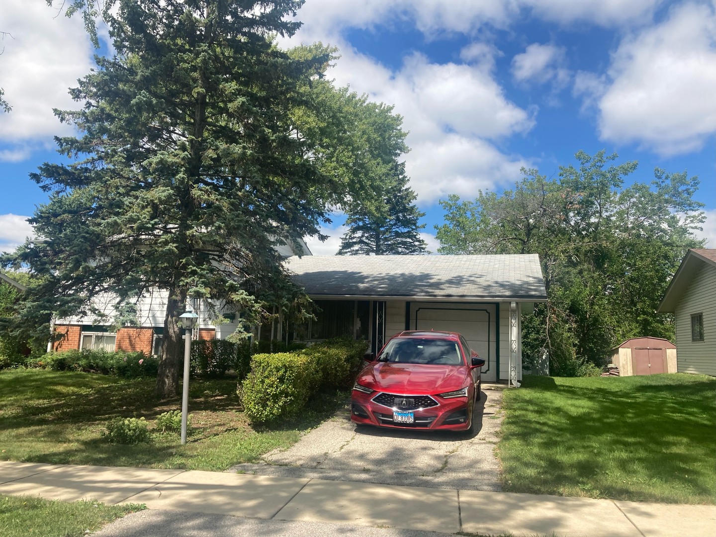 430 Bode Road Hoffman Estates, IL 60169 - Photo 1 of 1 a view of a car parked in front of a house