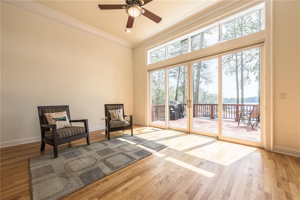 9510 Lisa Circle Gainesville, GA 30506 - Photo 24 of 80 a spacious bedroom with a large bed and a large window