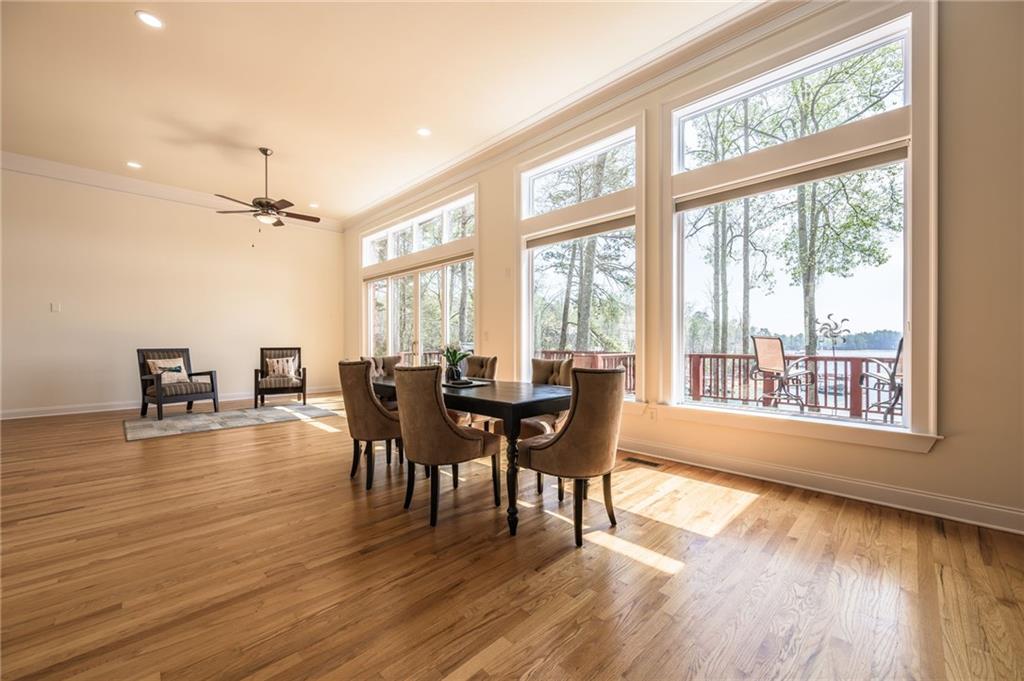 9510 Lisa Circle Gainesville, GA 30506 - Photo 26 of 80 a view of a dining room with furniture window and wooden floor