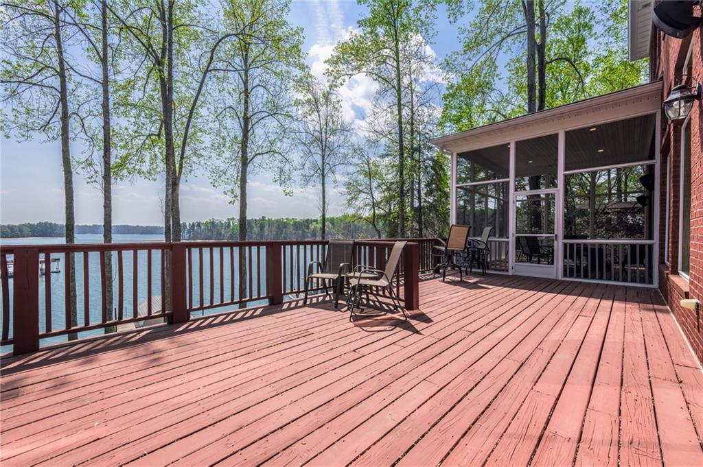 9510 Lisa Circle Gainesville, GA 30506 - Photo 38 of 80 a view of a deck with wooden floor and outdoor space