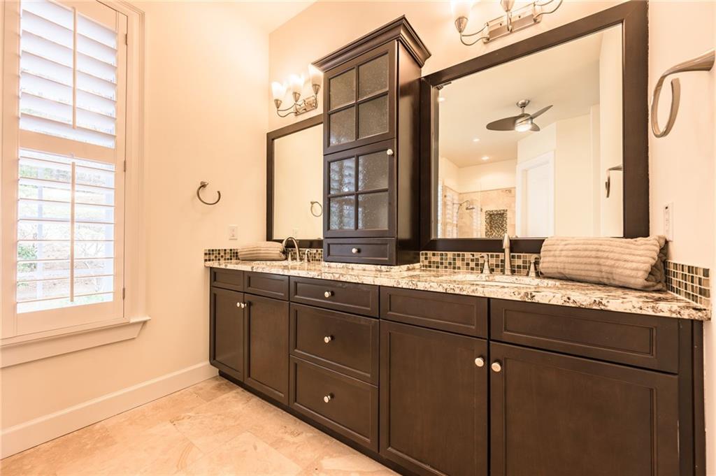 9510 Lisa Circle Gainesville, GA 30506 - Photo 51 of 80 a bathroom with a granite countertop sink mirror and double