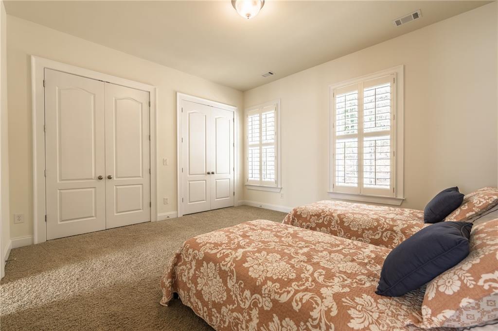 9510 Lisa Circle Gainesville, GA 30506 - Photo 57 of 80 a bedroom with a bed and a window