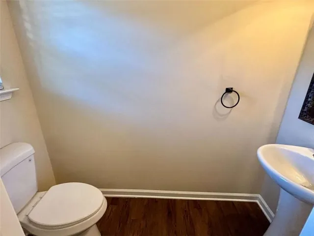 a bathroom with a toilet and sink