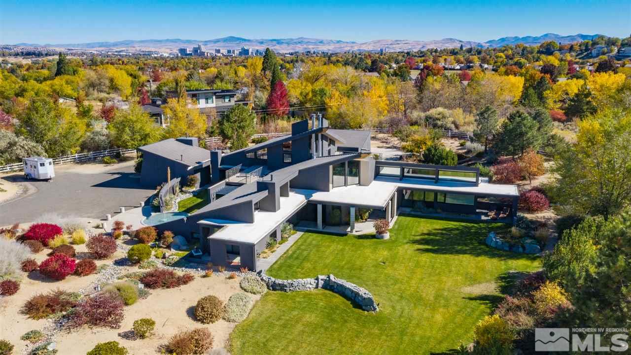 350 Juniper Hill Road Reno, NV 89519 - Photo 1 of 24 an aerial view of a house with a ocean view