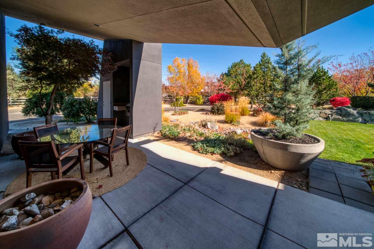 350 Juniper Hill Road Reno, NV 89519 - Photo 18 of 24 a view of a porch with furniture and a yard