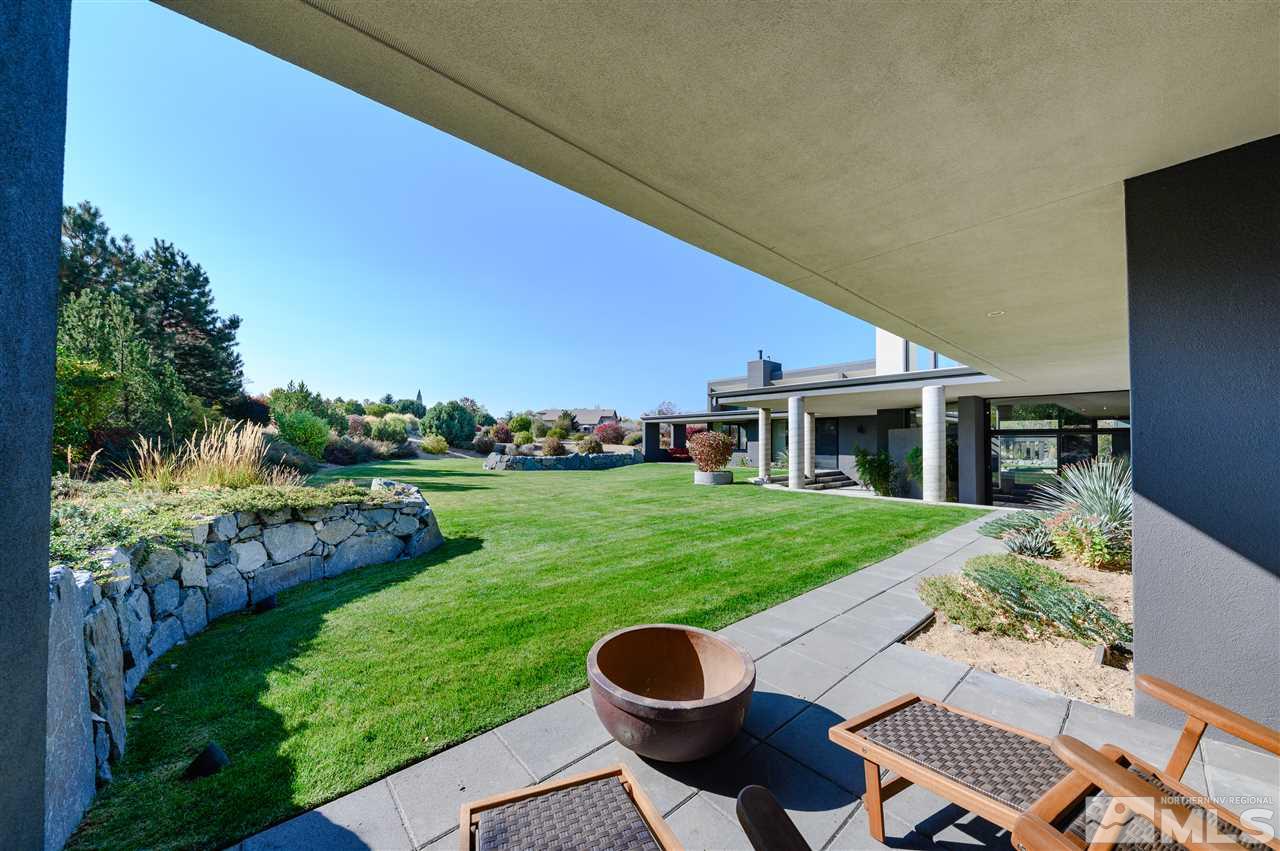 350 Juniper Hill Road Reno, NV 89519 - Photo 2 of 24 a front view of a house with a yard