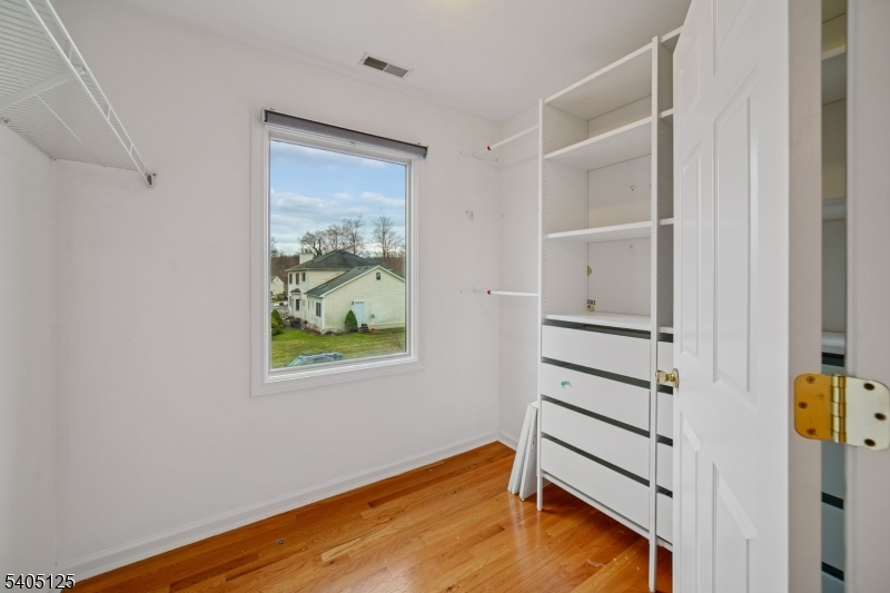 17 Grove Street Summit, NJ 07901 - Photo 21 of 42 a view of room with wooden floor and window