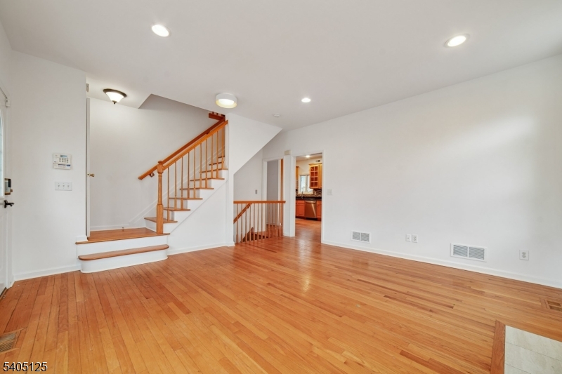 17 Grove Street Summit, NJ 07901 - Photo 3 of 42 a view of an empty room with wooden floor