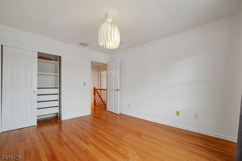 17 Grove Street Summit, NJ 07901 - Photo 33 of 42 a view of empty room with wooden floor