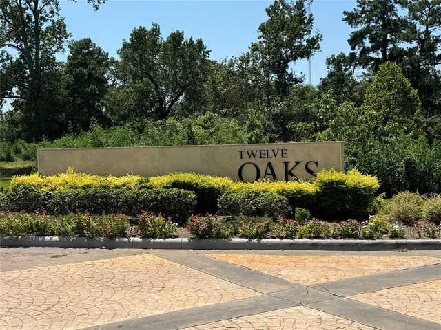 a view of a street with a bench