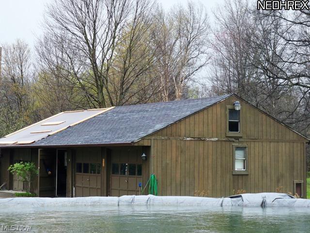 6421 Peck Road Ravenna, OH 44266 - Photo 14 of 15 Detached 4 car garage does need roof repair possible replacement buyer will assume