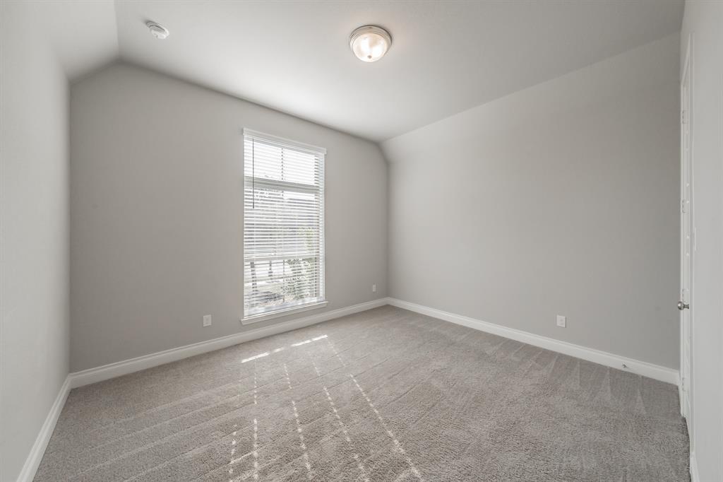 795 Knoxbridge Road Forney, TX 75126 - Photo 5 of 17 an empty room with windows