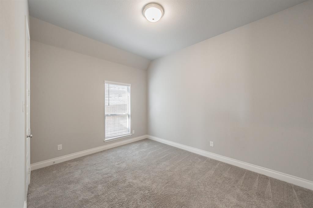 795 Knoxbridge Road Forney, TX 75126 - Photo 7 of 17 an empty room with window